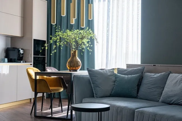 Modern clean living room with teal accents